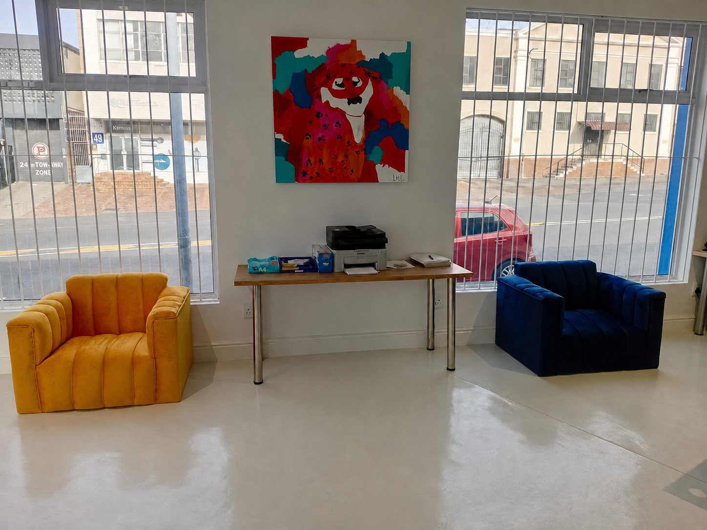 The welcoming seating area inside the Trust Garde office with clear windows